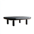 Table basse rectangulaire noire avec pieds cylindriques